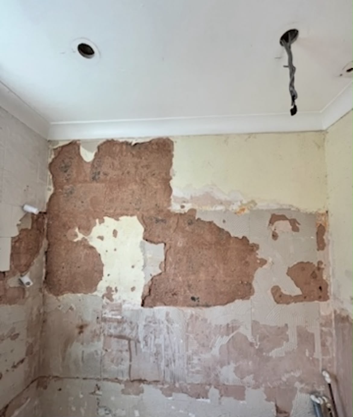 Damaged and stripped wall surfaces ready for repair